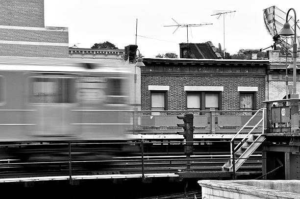 NYC B&W - Bronx Elevated Subway train in blurred motion stock photo