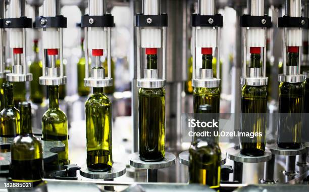 Closeup Of Bottles In A Bottling Plant Factory Stock Photo - Download Image Now - Bottling Plant, Wine, Industry