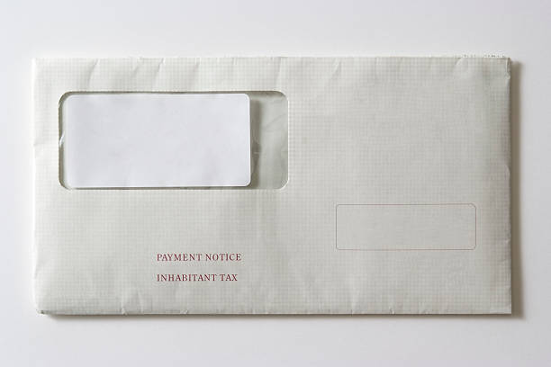 istock Isolated shot of blank tax payment envelope on white background 182885209