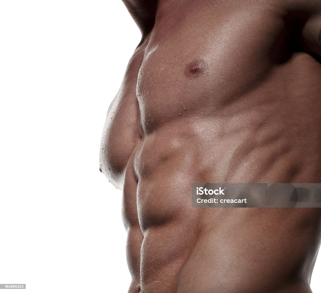 Muscoloso Torso maschile contro bianco - Foto stock royalty-free di Abbronzatura