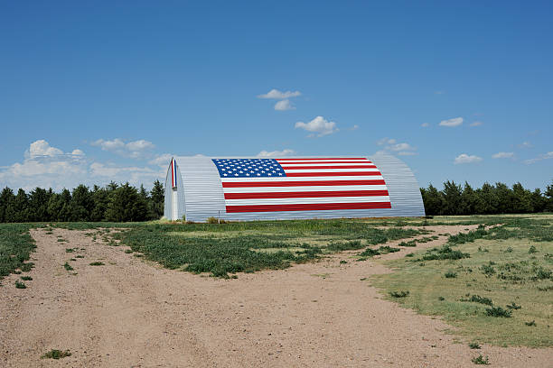 istock American flag painted on farm building 182885736