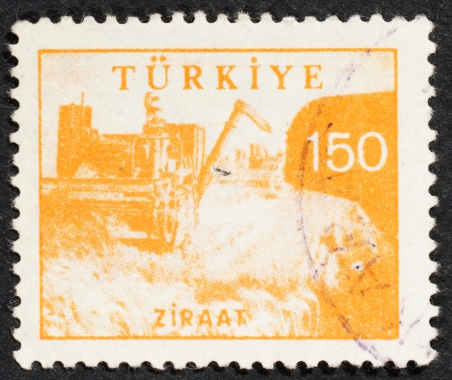 Turkish postage stamp on black background