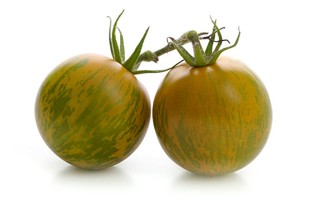 ゼブラトマト - heirloom tomato zebra tomato tomato organic ストックフォトと画像