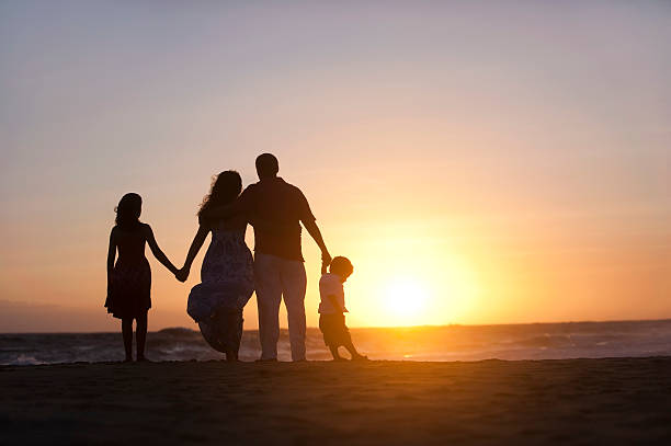istock Family watching the sunset 182886464