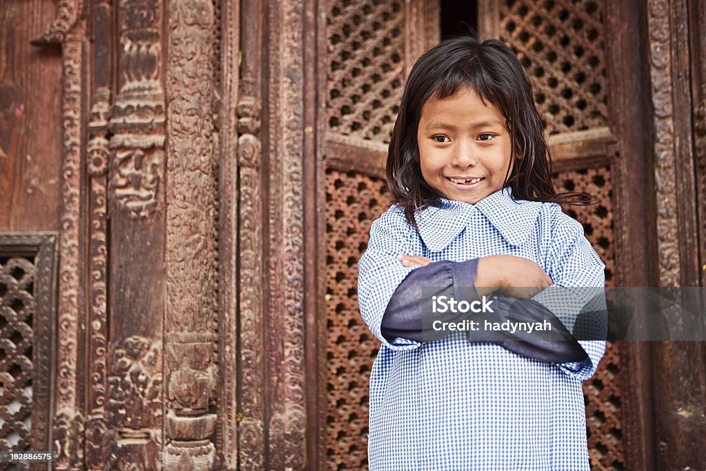 Young Nepali girl Young girl playing on Durbar Square, Patan.http://bem.2be.pl/IS/nepal_380.jpg Adult Stock Photo