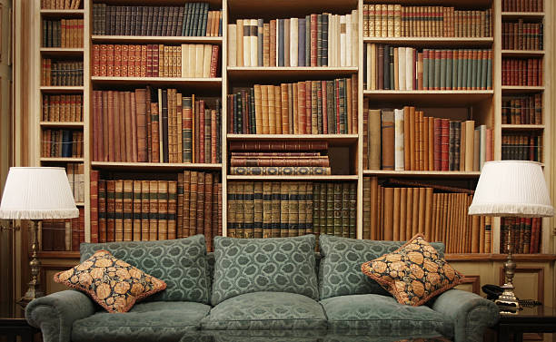 Ancient Books on an Old Bookshelf in a Library