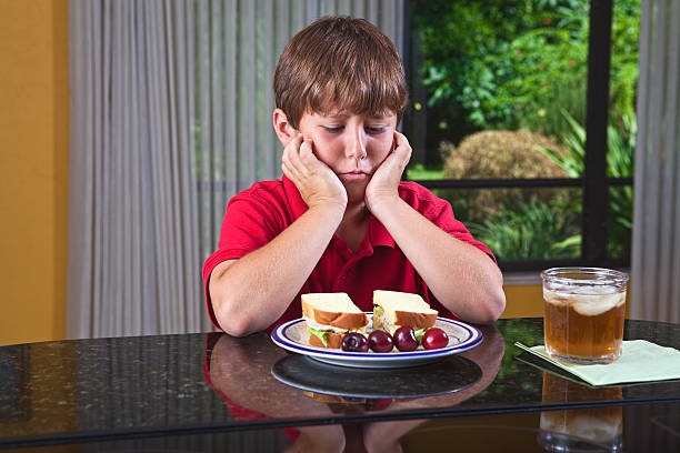 hora de almoço - eating sandwich emotional stress food imagens e fotografias de stock