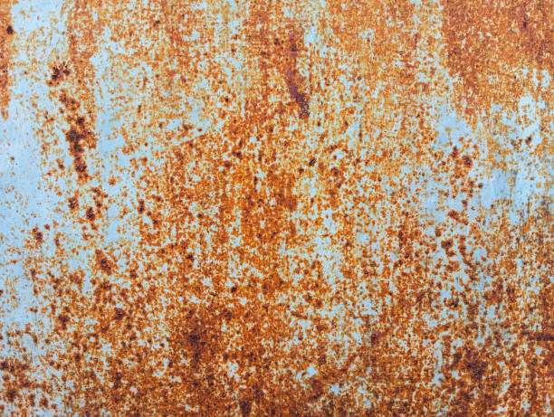 istock Abstract brown rusty grunge background. Weathered and rusty metallic board. Rusted metal plate texture with copy space. 1828882588