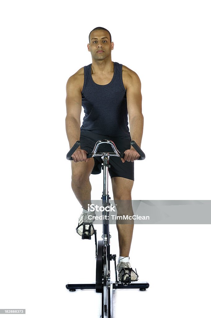 Male on exercise bike Cut Out Stock Photo