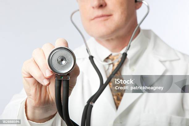 Doctor With Stethoscope Stock Photo - Download Image Now - Adult, Adults Only, Arms Outstretched