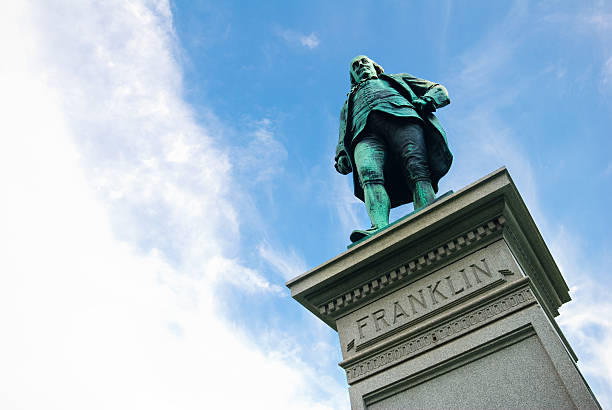 Statue of Benjamin Franklin at Lincoln Park in Chicago, IL "Statue of Benjamin Franklin at Lincoln Park in Chicago, IL. Sculpted by R.H. Park and donated to the city of Chicago by Joseph Medill in 1896. The bronze statue is 9 feet high set upon a 12 foot high pedestal." benjamin franklin photos stock pictures, royalty-free photos & images