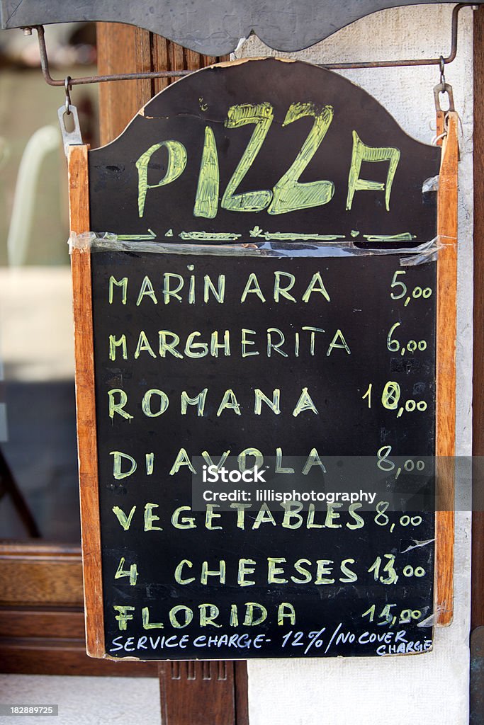 Pizza Menu in Venice Italy Pizza Menu in Venice Italy outside sidewalk cafe Chalkboard - Visual Aid Stock Photo