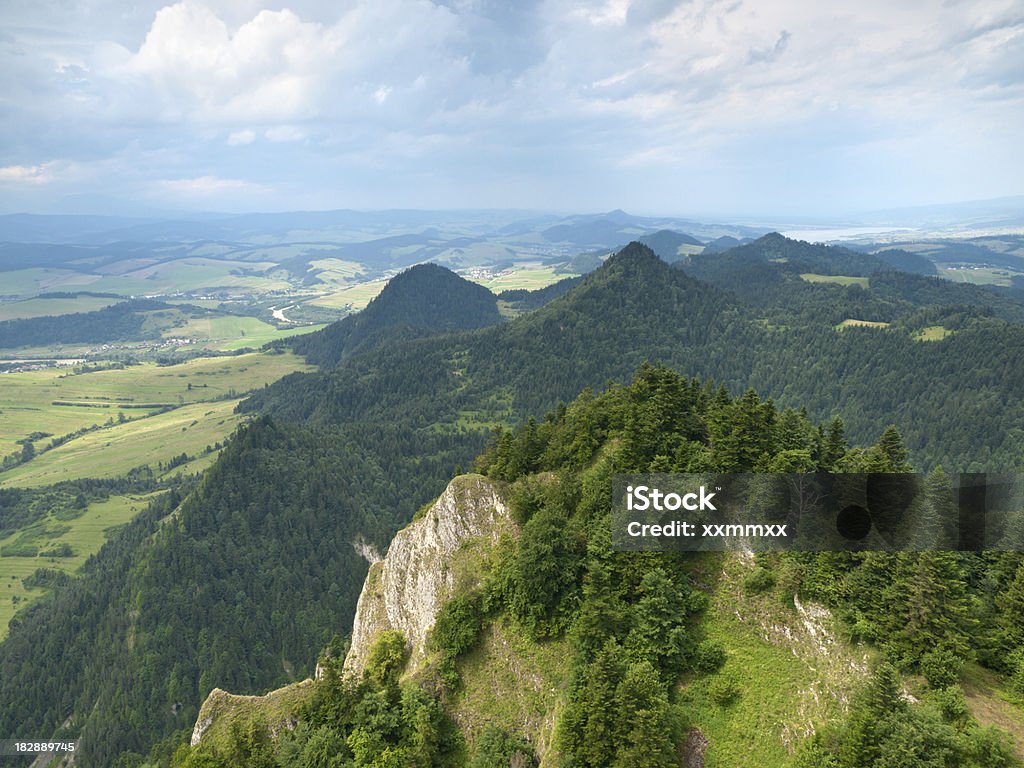 Mountains in grass View from Three Crowns peak. Shot from Pieniny mountains in Poland. Cloud - Sky Stock Photo