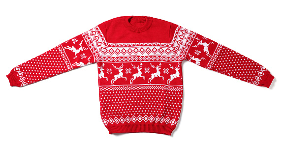 Red Christmas sweater with reindeer ornament isolated on white, top view