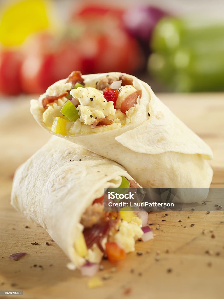 Breakfast Burrito with Scrambled Eggs "Breakfast Burrito with Scrambled Eggs, Bacon, Sausage, Tomatoes and Peppers -Photographed on Hasselblad H3D2-39mb Camera" Breakfast Stock Photo