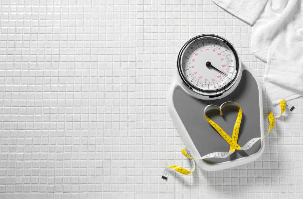 istock Tape Measure and Weighing Scales 182891118