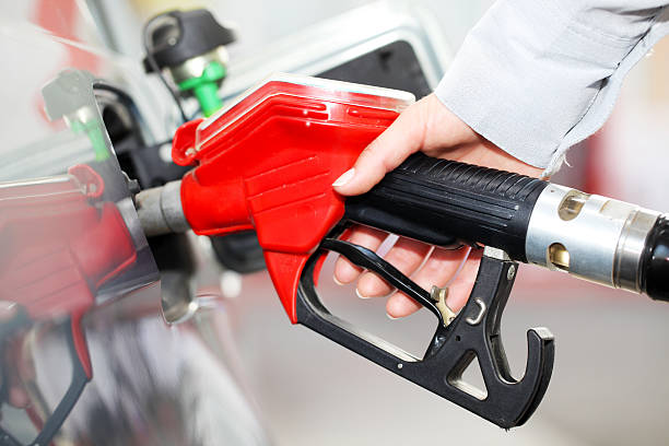istock Person refueling a car at gas station. 182891199