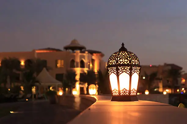"An arabesque lantern lamp Symbol of Ramadan times, also a famous Middle eastern (specially in morocco and Egypt) lighting decoration item..Some copy space was left up to fit greeting or title textMore Similar and Arabia Related.."