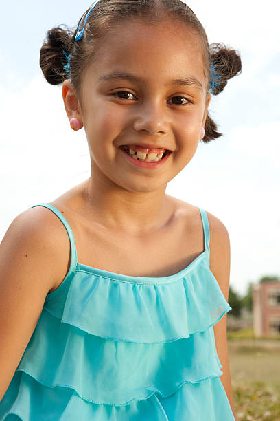 istock young girl posing outdoors 182891829