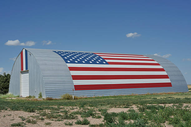istock US Flag painted on high plains farm building 182892091