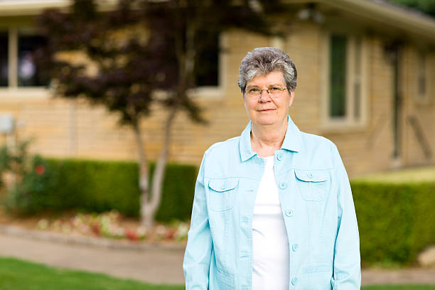 istock mature woman homeowner 182892622