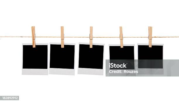 Blank Instant Photo Prints On A Washing Line Stock Photo - Download Image Now - Instant Print Transfer, Instant Camera, Photograph