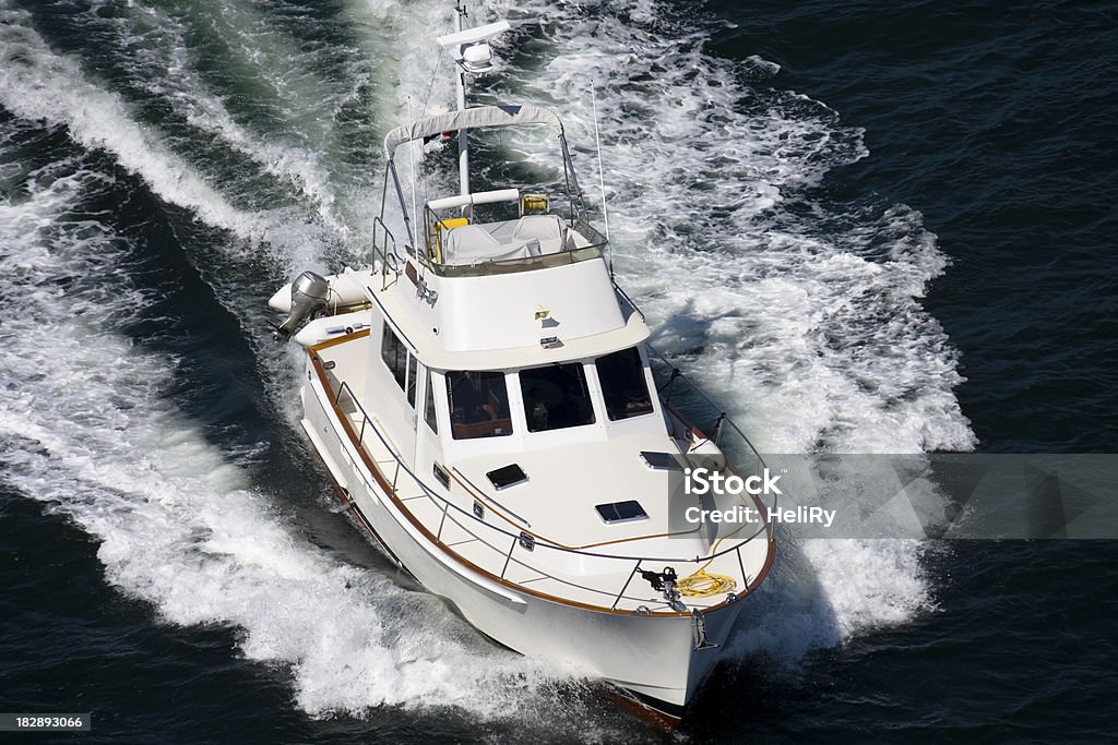 Motorboat  makes a splash Aerial look at a large motorboat. Activity Stock Photo