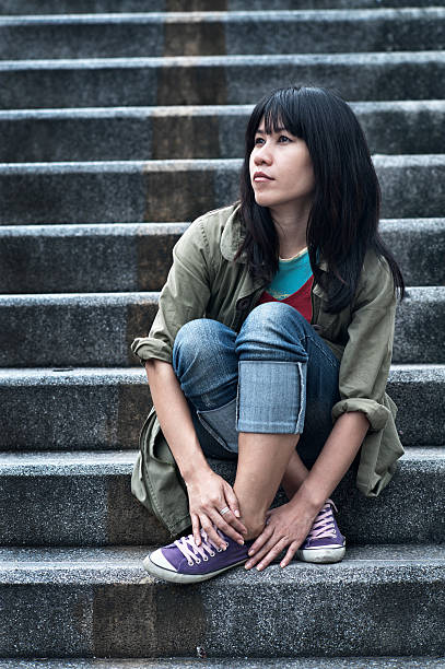 istock Sad Young Asian Woman 182893498