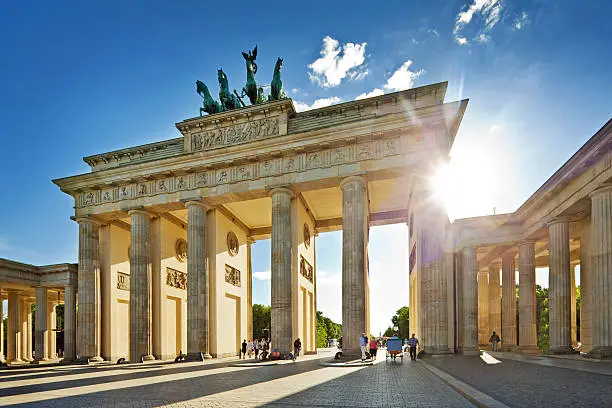 "Brandenburg GateBerlin, Germanysome lens flare, people in motion blur"