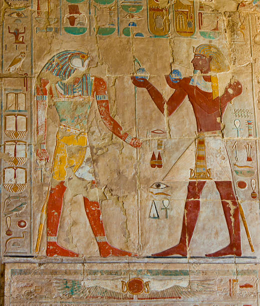 Egyptian painted wall Egyptian Painted wall at the Hatshepsut Temple hatshepsut photos stock pictures, royalty-free photos & images