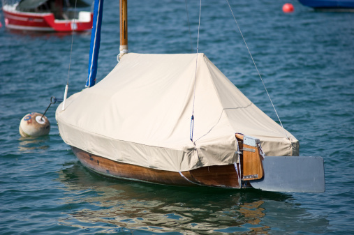 covered sailboat