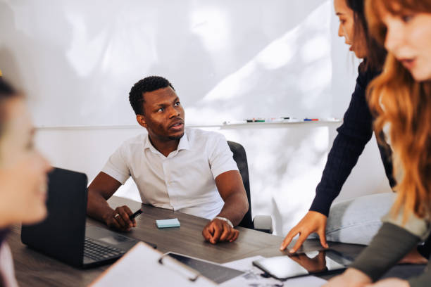 istock A multicultural businessman is discussing with colleagues about project. 1828956024