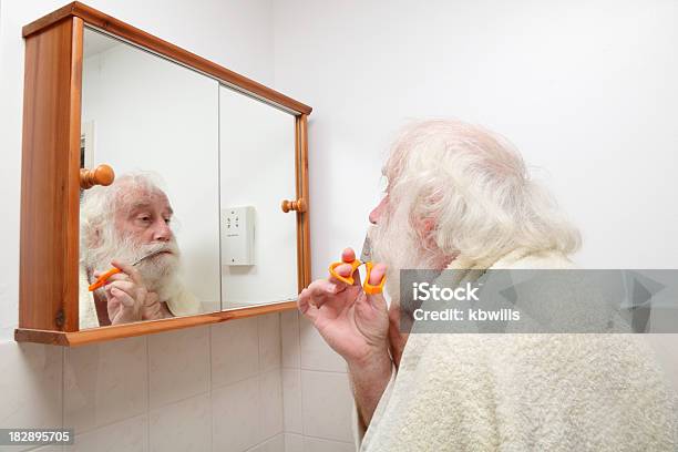 Senior Male Trimming Large Beard And Moustache Stock Photo - Download Image Now - Adult, Adults Only, Bathroom