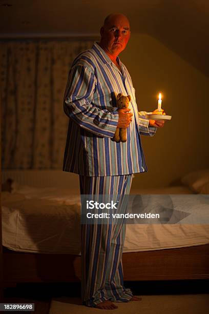 diep Verwaarlozing metalen Bedtime With Candle And Striped Pyjamas Stock Photo - Download Image Now -  60-69 Years, Adult, Adults Only - iStock