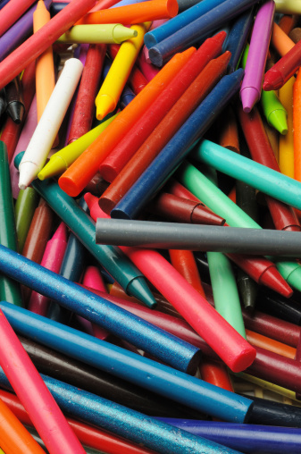 Pile of crayons in bucket