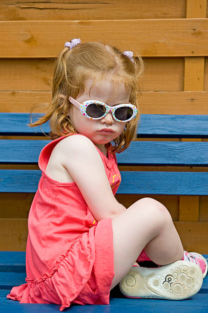 istock Little girl sulking 182897254