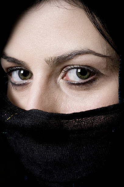 istock Enigmatic young woman 182897402