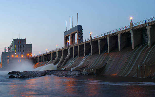 Landscape of a hydroelectric dam at dusk stock photo