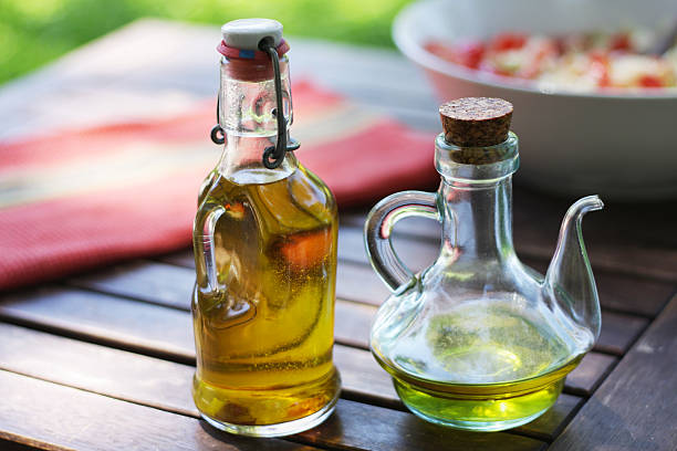 istock Olive oil bottle outdoors 182897922