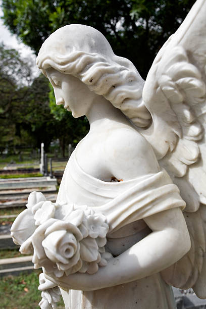 istock angel  carved in white marble 182898261