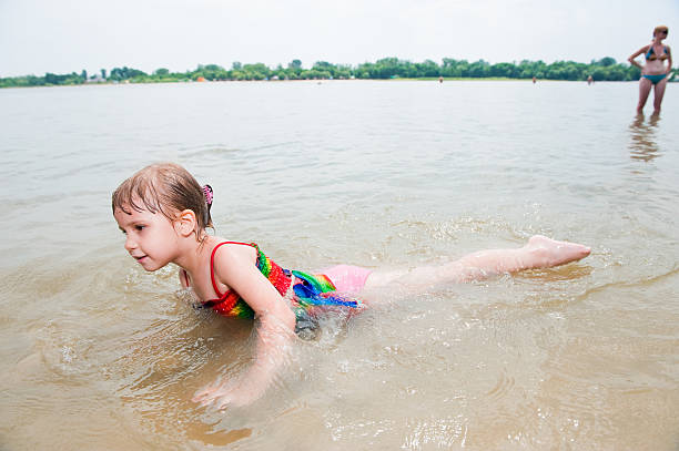 istock Girl on the shore. 182898291