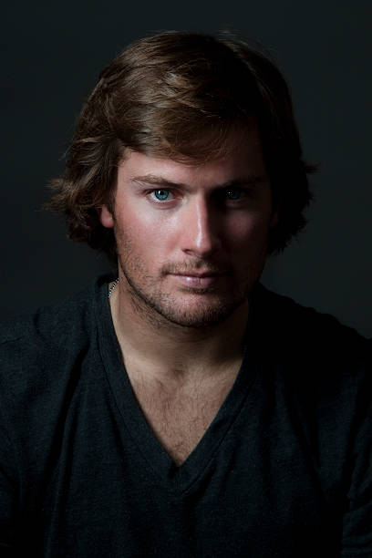istock Real people: portrait of a handsome young man on grey 182899143