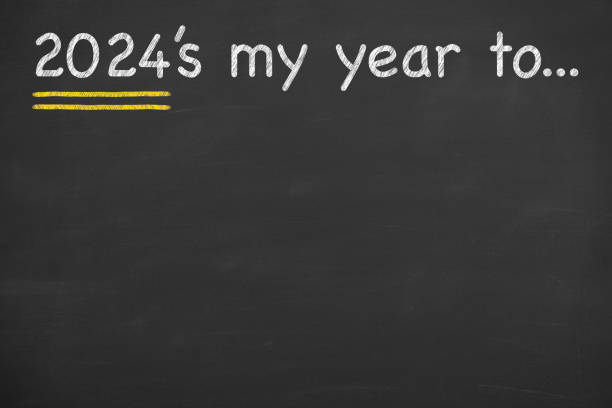istock Drawing 2024's my year to on blackboard background 1829001501