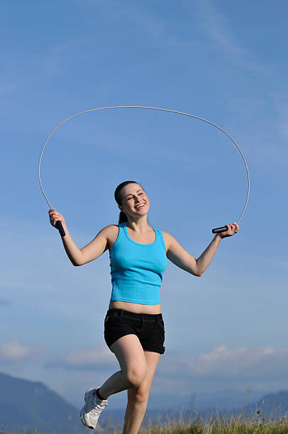 istock woman jumping rope 182900235