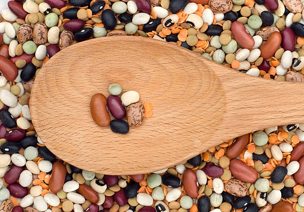 istock Beans on wooden spoon 182900428