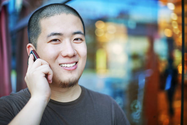 istock Asian man on the phone 182900525