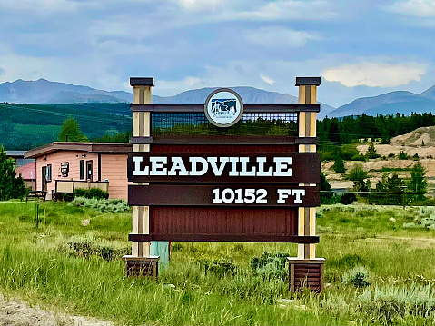 Leadville, Colorado, USA - July 16, 2021: A sign welcomes visitors to the historic silver mining town of Leadville in the Rocky Mountains on an overcast summer day.