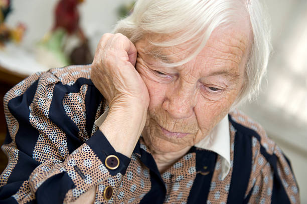 istock Female senior looks sad 182900875