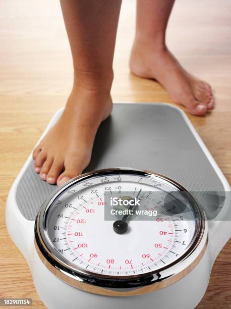 Stepping On Bathroom Scales Stock Photo - Download Image Now - Weight Scale, Bathroom Scale, Balance