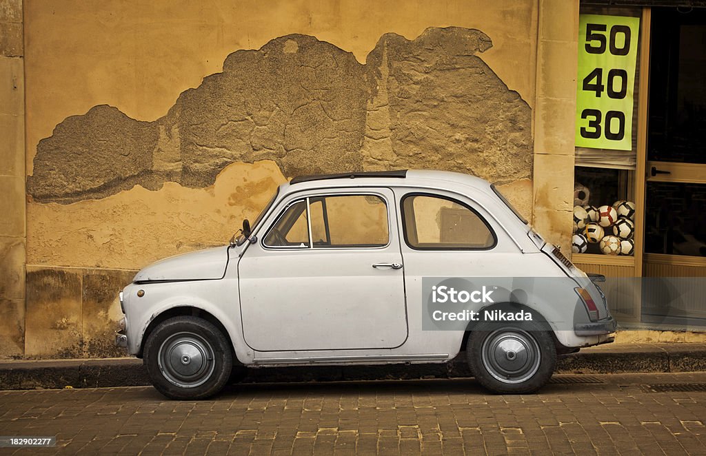 italian car in sicily Vintage white italian carUrban Street Scene in Italy (Sicily) 1960-1969 Stock Photo